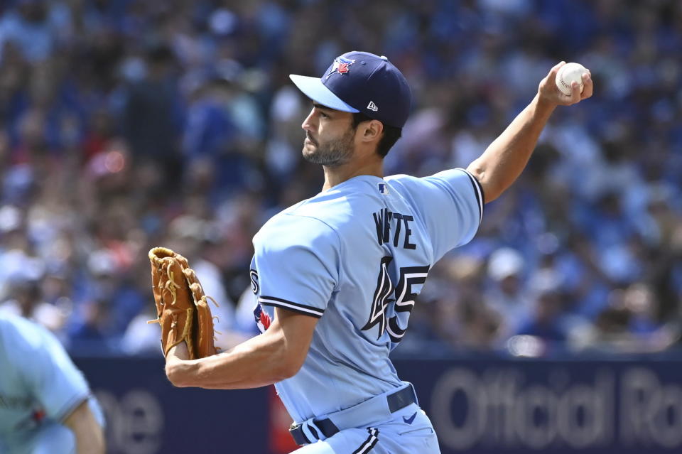 Toronto Blue Jays starting pitcher Mitch White throws to a Cleveland Guardians batter in first-inning baseball game action in Toronto, Saturday, Aug. 13, 2022. (Jon Blacker/The Canadian Press via AP)