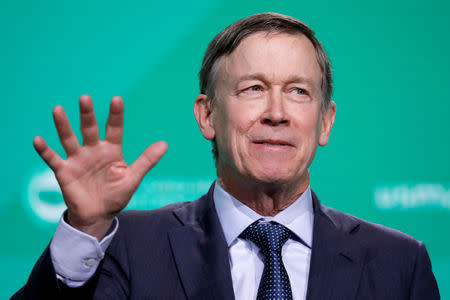 FILE PHOTO: Former Gov. John Hickenlooper (D-CO) speaks at the United States Conference of Mayors winter meeting in Washington, U.S., January 24, 2019. REUTERS/Yuri Gripas/File Photo
