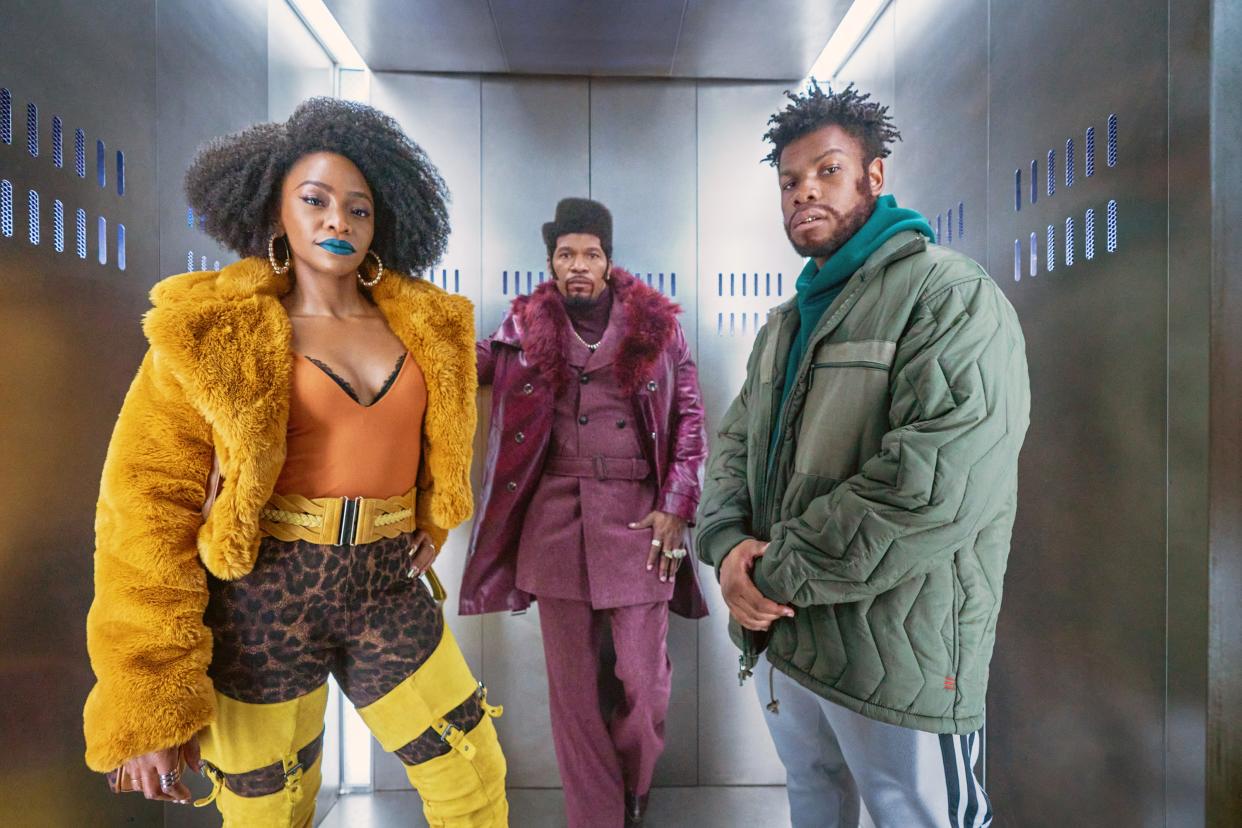 THEY CLONED TYRONE, from left: Teyonah Parris, Jamie Foxx, John Boyega, 2023. ph: Parrish Lewis / © Netflix / Courtesy Everett Collection