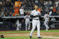 New York Yankees' Aaron Hicks reacts after striking out against the Houston Astros during the sixth inning in Game 3 of baseball's American League Championship Series Tuesday, Oct. 15, 2019, in New York. (AP Photo/Matt Slocum)