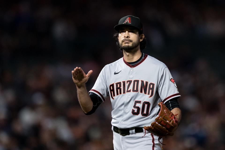 Sep 30, 2021; San Francisco, California, USA; Arizona Diamondbacks relief pitcher Noe Ramirez (50) reacts after the end of the seventh inning of the game against the San Francisco Giants at Oracle Park. Mandatory Credit: John Hefti-USA TODAY Sports