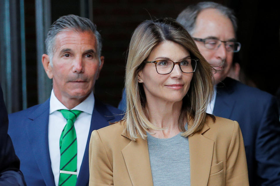 Actor Lori Loughlin, and her husband, fashion designer Mossimo Giannulli, leave the federal courthouse after facing charges in a nationwide college admissions cheating scheme, in Boston, Massachusetts, U.S., April 3, 2019. REUTERS/Brian Snyder