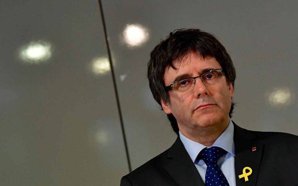 Catalonia's ousted leader Carles Puigdemont attends a press conference in Berlin - AFP