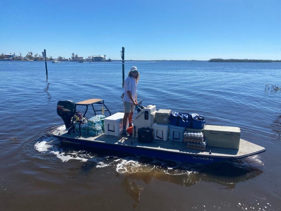 George Buonocore IV delivers supplies by boat to Pine Island after Hurricane Ian.