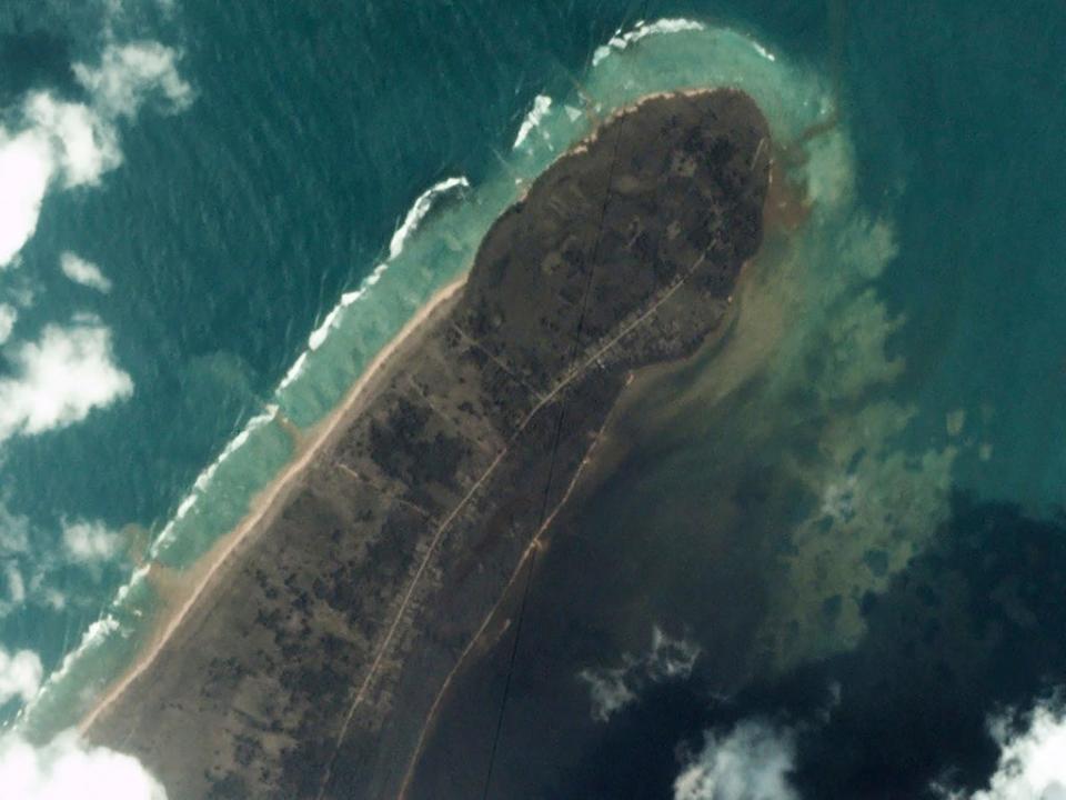 Kanokupolu in Tongatapu can be seen covered in ash (AP)