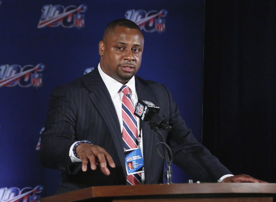 FILE - In this May 22, 2019, file photo, NFL vice president Troy Vincent speaks to the media during an owners meetings in Key Biscayne, Fla. Troy Vincent wrapped up the NFL’s three-day General Manager Forum and Quarterback Coaching Summit with a passionate plea to anyone who still thinks there aren’t worthy Black candidates for head coaching positions. (AP Photo/Brynn Anderson, File)