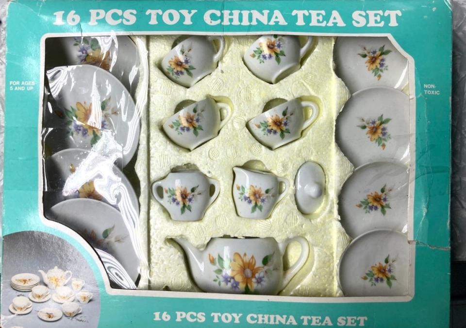 A 16-piece toy china set in box