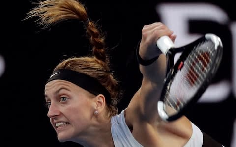 Kvitova digs deep to hold serve during the second set - Credit: AP