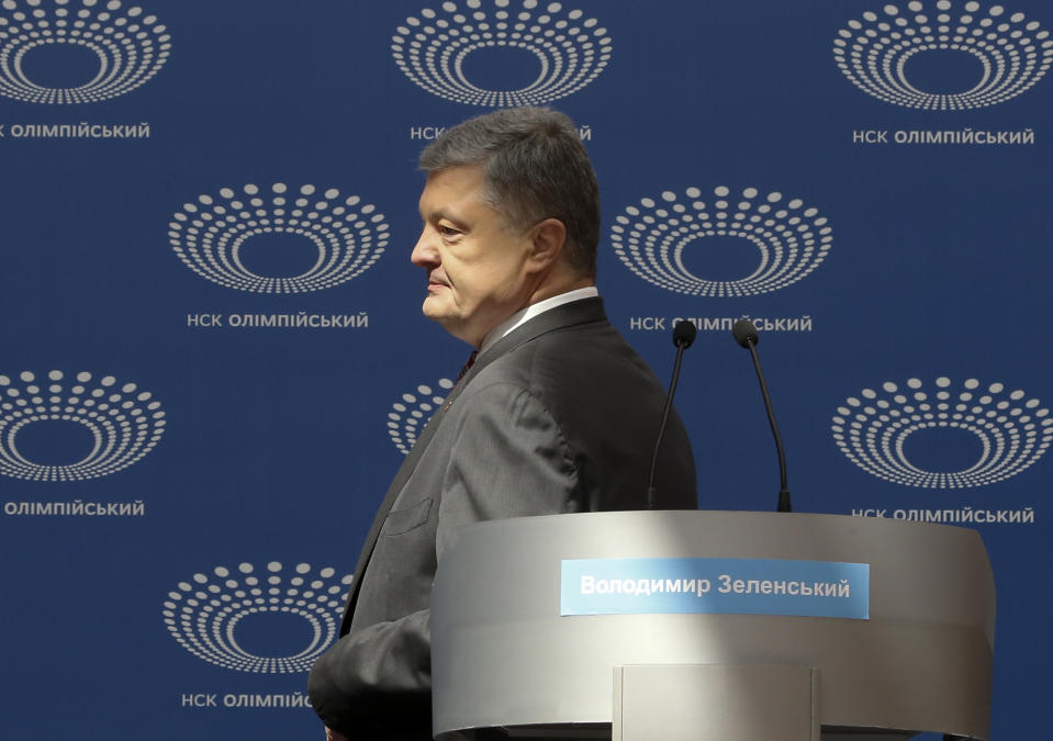 Ukrainian President Petro Poroshenko arrives to deliver his speech ahead of the presidential elections on April 21, at the Olympic stadium in Kiev, Ukraine, Sunday, April 14, 2019. (AP Photo/Efrem Lukatsky)