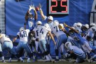 <p>San Diego Chargers nose tackle Damion Square, top left, gets his hands up as Tennessee Titans kicker Ryan Succop kicks an extra point field goal during the first half of an NFL football game Sunday, Nov. 6, 2016, in San Diego. (AP Photo/Rick Scuteri) </p>