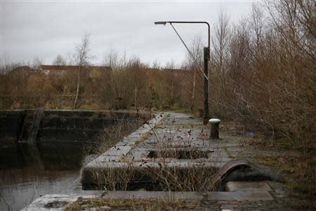 A broken light is seen at the Govan Graving Docks in Glasgow, Scotland January 15, 2014. REUTERS/Stefan Wermuth