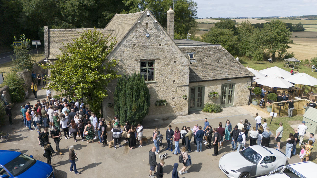 People queuing outside at the opening of Jeremy Clarkson's new pub, The Farmer's Dog