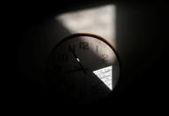 A Quran verse that reads "Allah is with those who are patient", is reflected on a clock at Al Noor mosque where more than 40 people were killed by a suspected white supremacist during Friday prayers on March 15, in Christchurch, New Zealand April 1, 2019. REUTERS/Edgar Su