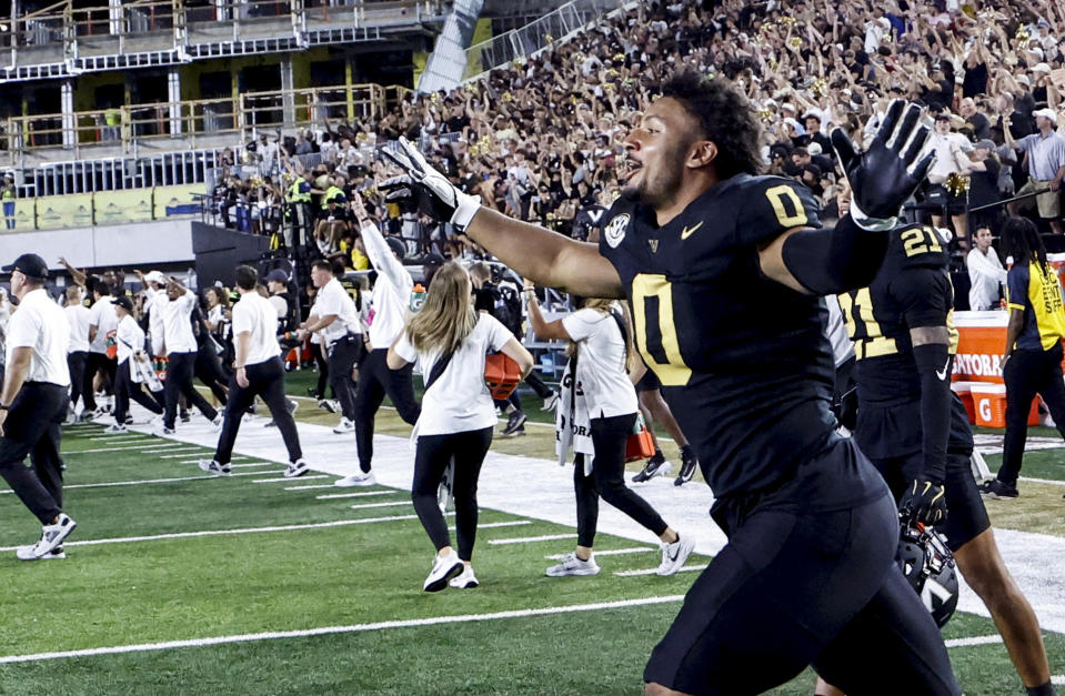 Vanderbilt Commodores defensive lineman Aeneas DiCosmo (0) runs onto the field after defeating the Alabama Crimson Tide. (Butch Dill-Imagn Images)