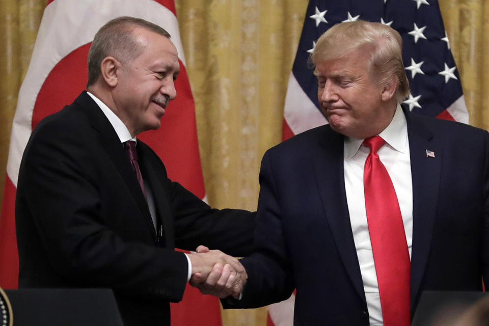 President Donald Trump shakes hands with Turkish President Recep Tayyip Erdogan after a news conference in the East Room of the White House on Wednesday.