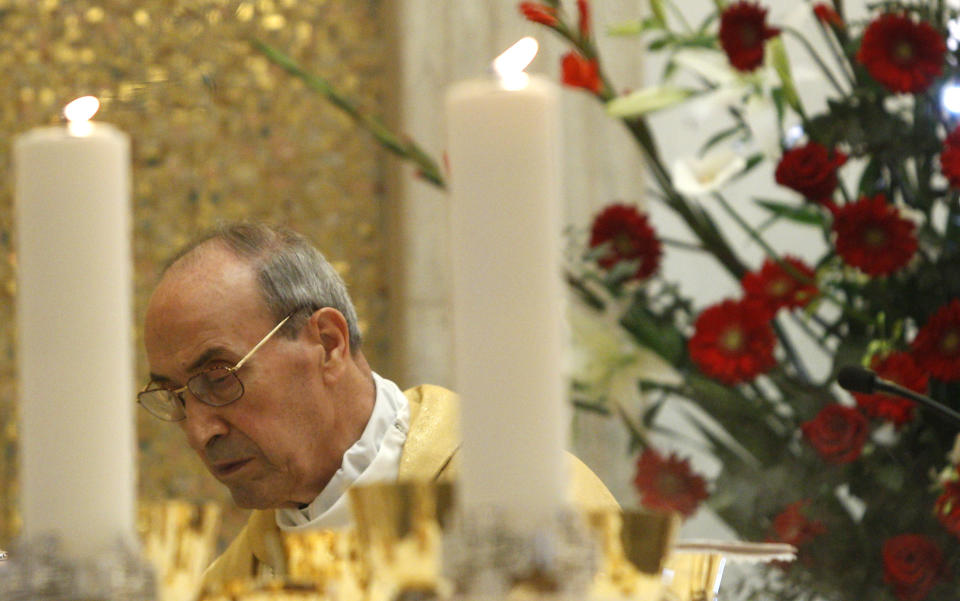 Cardinal Velasio De Paolis celebrates a mass in the Legion of Christ main headquarters, the Ateneo Pontificio Regina Apostolorum, in Rome, Tuesday, Feb. 25, 2014. Cardinal De Paolis, the pope's envoy running the troubled Legion of Christ has ended his three-year reform effort, declaring the order "cured and cleaned" but acknowledging it bears the guilt of its pedophile founder and those who delayed admitting his crimes. (AP Photo/Riccardo De Luca)