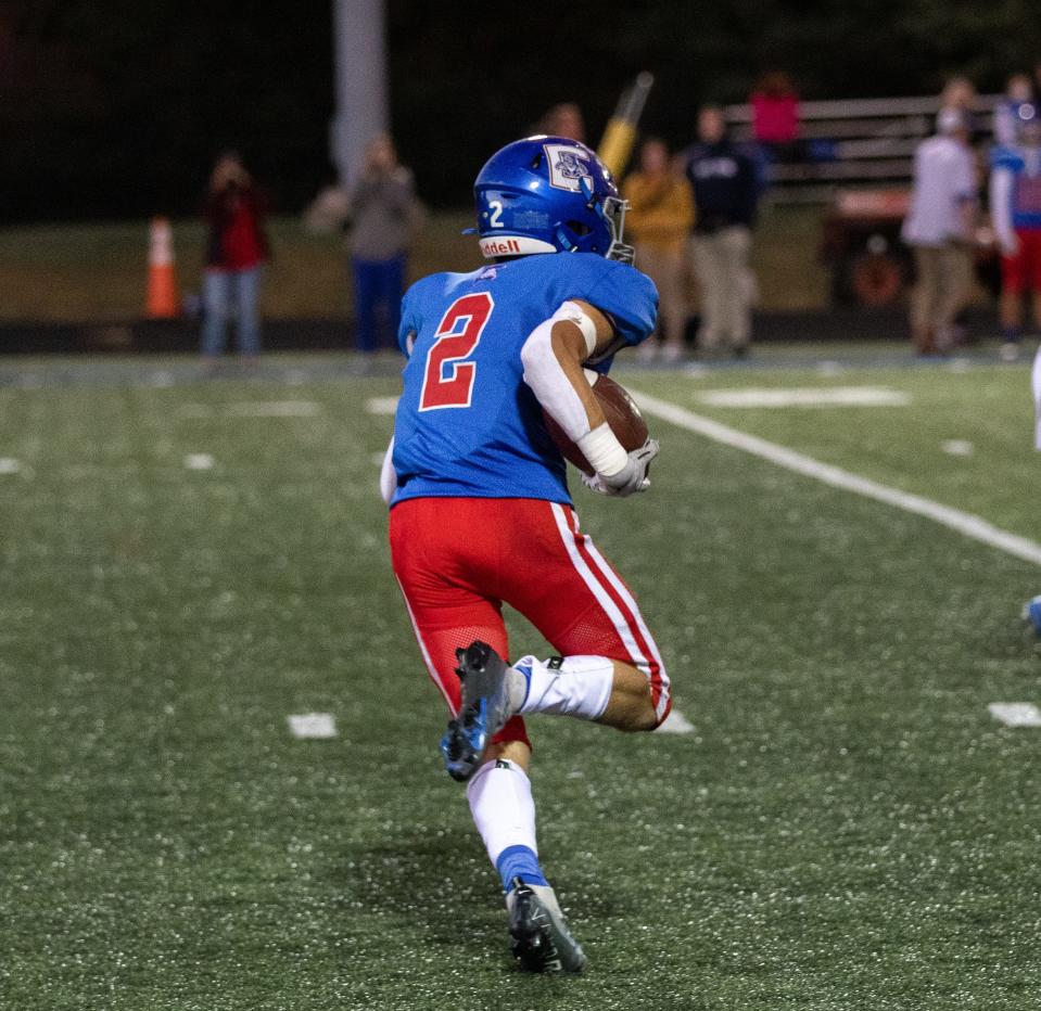 Conner senior Kentyn Moore carries the ball in the game between Highlands and Conner high schools Friday, Sept. 30, 2022.