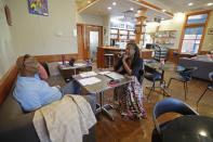 Tamika Catchings meets with Rod Haywood, senior lecturer at Indiana University's Kelley School of Business, at Tea's Me Cafe, Wednesday, June 26, 2019, in Indianapolis. (AP Photo/Darron Cummings)