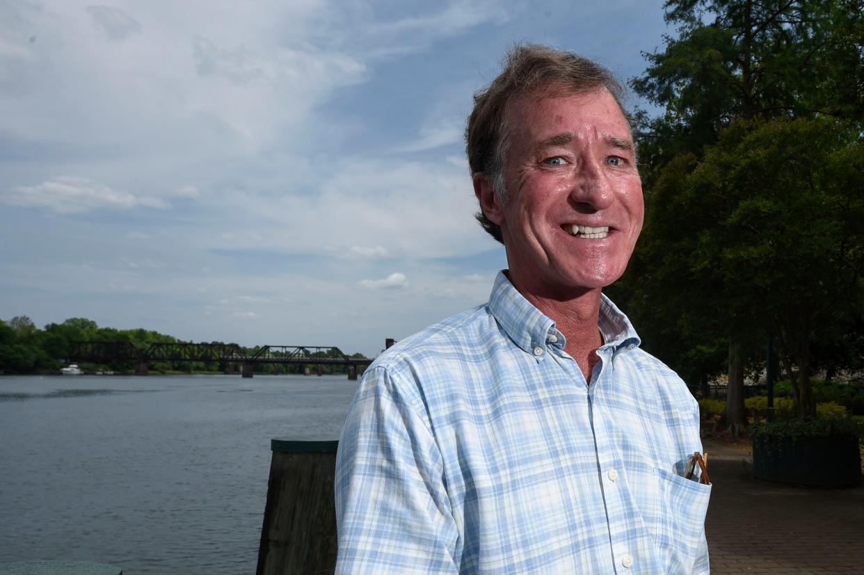 Former Mayor of Augusta Deke Copenhaver poses for a portrait on the Augusta Riverwalk.