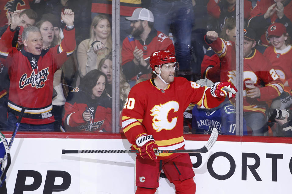 Calgary Flames' Blake Coleman celebrates his goal against the Vancouver Canucks during the second period of an NHL hockey game Saturday, Dec. 31, 2022, in Calgary, Alberta. (Larry MacDougal/The Canadian Press via AP)