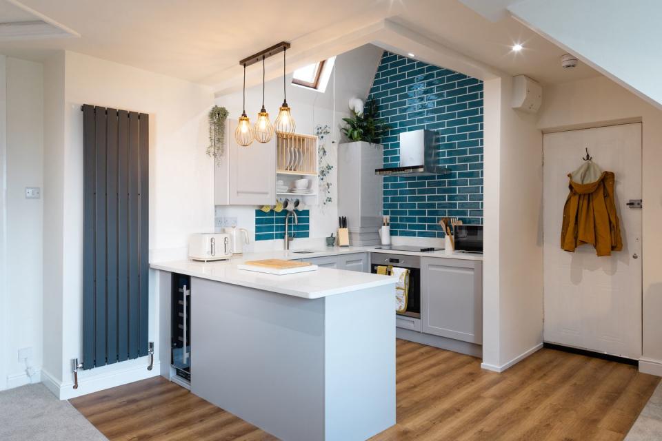 a modern kitchen in an attic flat