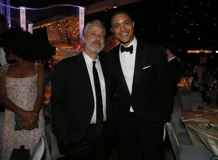 Television personality Jon Stewart (L) poses with actor Trevor Noah at the 67th Annual Primetime Emmy Awards Governors Ball in Los Angeles, California September 20, 2015. REUTERS/Mario Anzuoni