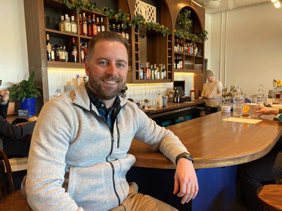 Cleveland City Councilman Kerry McCormack sits at Patron Saint, a cafe and aperitivo bar in Cleveland's Ohio City neighborhood, part of his district. Many Ohio City restaurants missed out on the economic boon promised by the Republican National Convention in 2016.