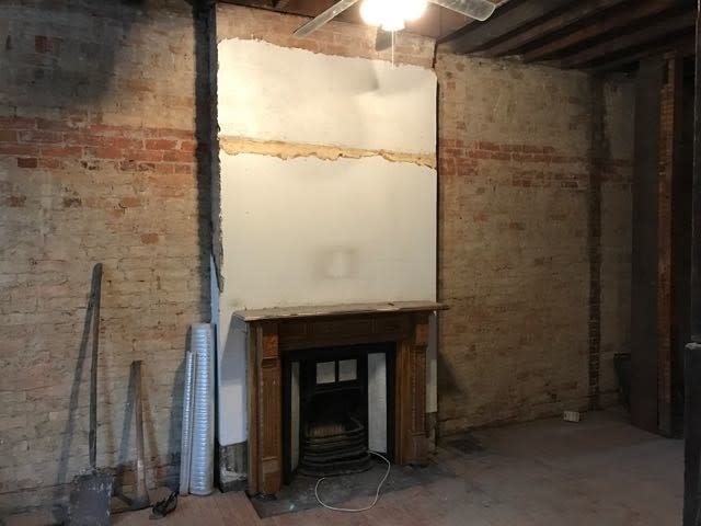 <p>As you can see from this shot of the living room, the house is currently not livable. A lot of work needs to be done, but for some buyers, that’s just what they’re looking for. </p>