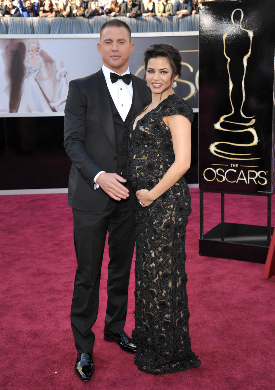 FILE - This Feb. 24, 2013 file photo shows actors Channing Tatum and his pregnant wife Jenna Dewan-Tatum at the 85th Academy Awards at the Dolby Theatre in Los Angeles. Fashion experts say a streamlined style best suits a baby bump. (Photo by John Shearer/Invision/AP)