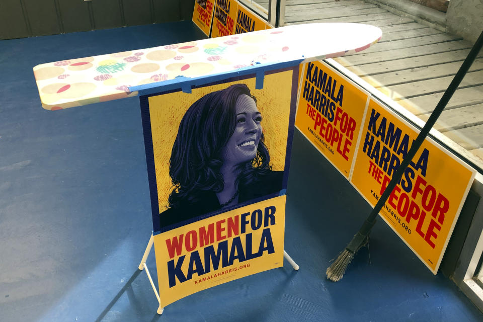 An ironing board decorates the front of a campaign office for Democratic presidential candidate Sen. Kamala Harris, D-Calif. in Mason City, Iowa., on Nov. 9, 2019. Harris often tells the story about setting up an ironing board outside grocery stores to meet voters during her first political campaign for San Francisco district attorney. (AP Photo/Kathleen Ronayne)