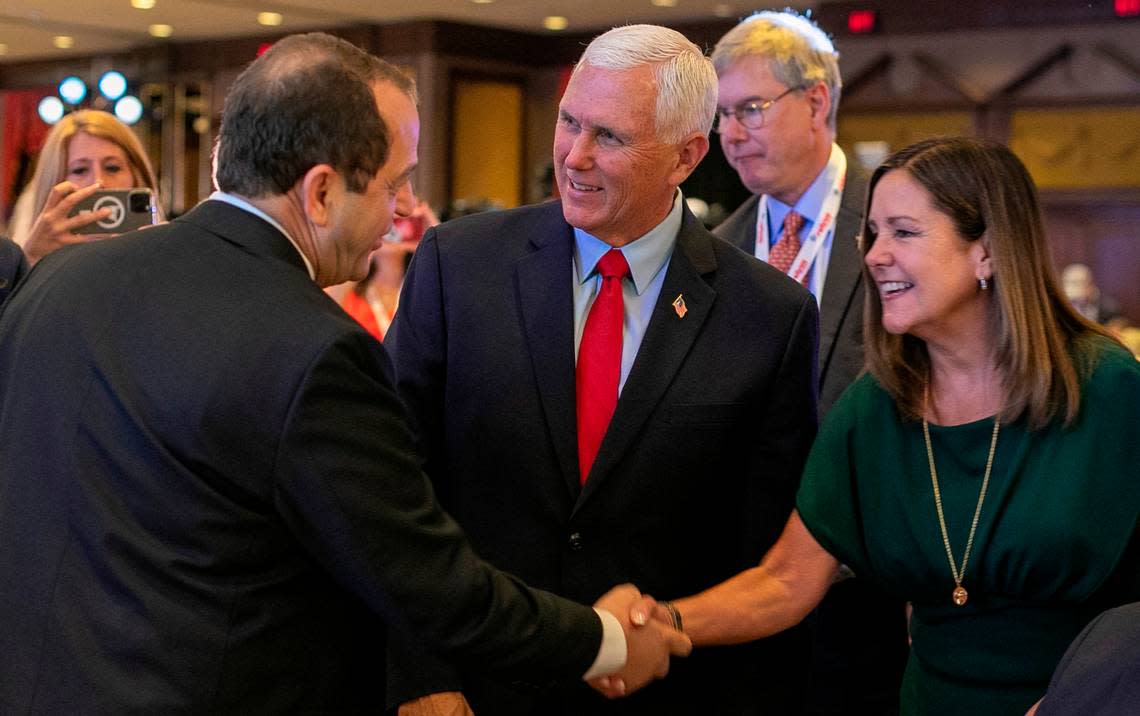 North Carolina Senator Michael Lazzara of Onslow County, shakes hands with Karen Pence as she and her husband former Vice President Mike Pence work the crowd prior to his address to the North Carolina Republican Party Convention at the Koury Convention Center on Saturday, June 10, 2023 in Greensboro, N.C. Robert Willett/rwillett@newsobserver.com