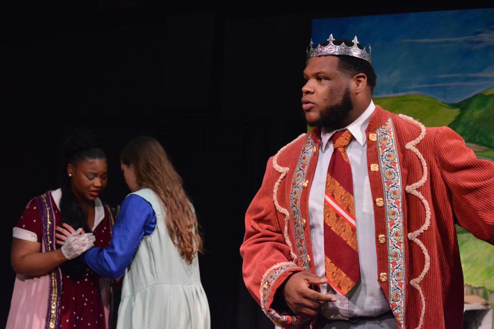 Martel Burton, who plays Don Pedro in GhostLight Theatre's production of Shakespeare's "Much Ado About Nothing," rehearses a scene with Lauren Yor'el Scott, as Hero, and Megan Hamel, as Beatrice, in the background. The play opens May 11 and continues through May 21, 2023, at the theater in Benton Harbor.