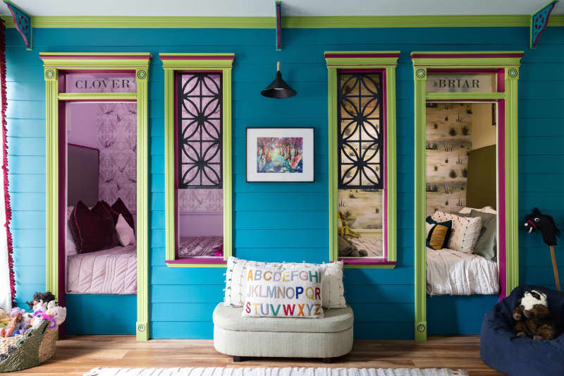 Turquoise and green kids room with 2 separate bed nooks