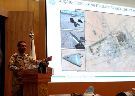 FILE PHOTO: Saudi defence ministry spokesman Colonel Turki Al-Malik displays on a screen drones which Saudi government says attacked an Aramco oil facility, during a news conference in Riyadh