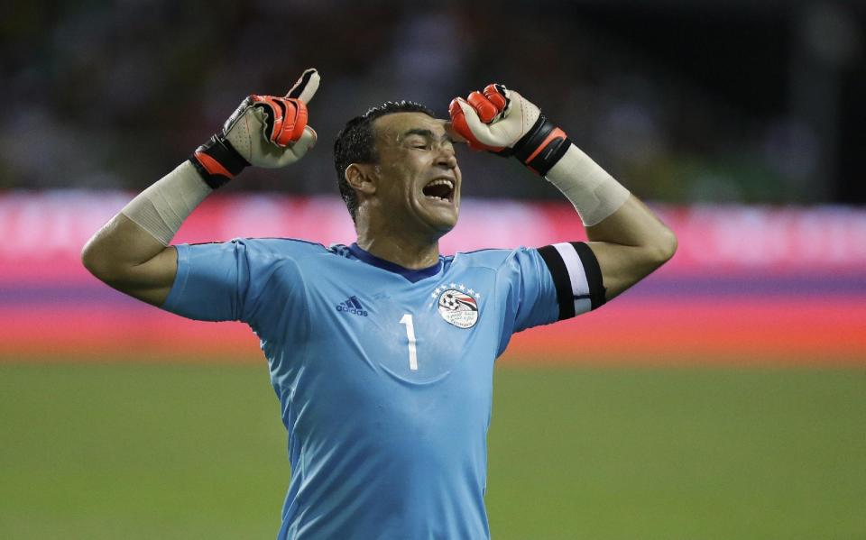 Egypt goalkeeper Essam El Hadary celebrates after Egypt's Mohamed Elneny scored the opening goal during the African Cup of Nations final soccer match between Egypt and Cameroon at the Stade de l'Amitie, in Libreville, Gabon, Sunday, Feb. 5, 2017. (AP Photo/Sunday Alamba)