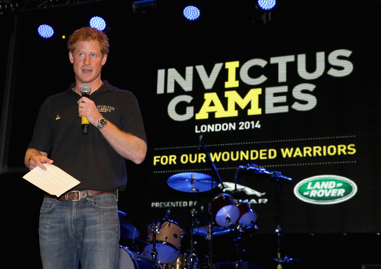 LONDON, ENGLAND - SEPTEMBER 09:  Prince Harry talks on stage at an Invictus Games Reception at the American Ambassador's Residence, Winfield House on September 9, 2014 in London, England. The International sports event for 'wounded warriors', presented by Jaguar Land Rover, is just days away with limited last-minute tickets available at www.invictusgames.org  (Photo by Chris Jackson/Getty Images)