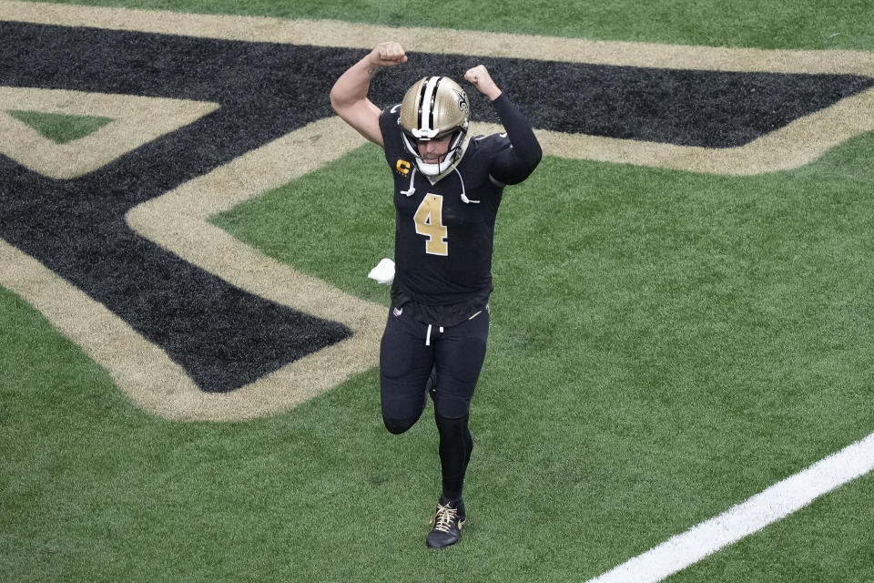 New Orleans Saints quarterback Derek Carr celebrates the team's touchdown against the Tennessee Titans in the second half of an NFL football game in New Orleans, Sunday, Sept. 10, 2023. (AP Photo/Gerald Herbert)