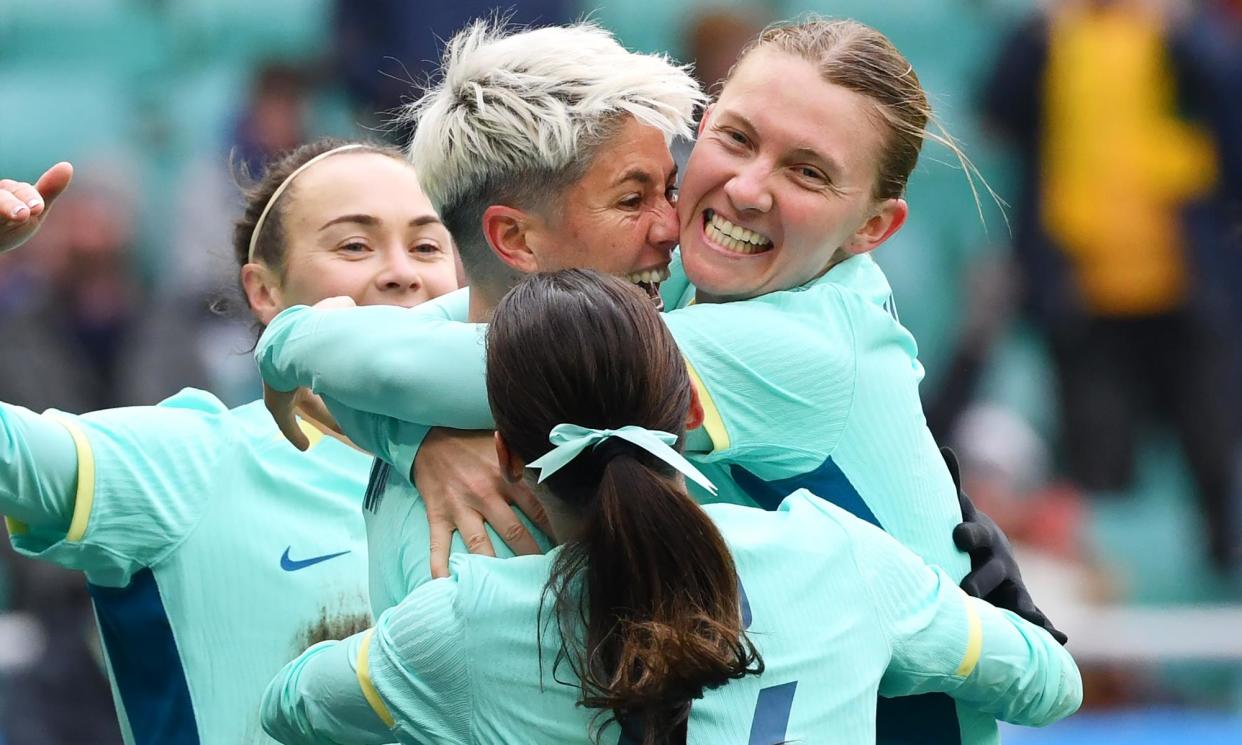<span>Australia’s Michelle Heyman celebrates the Matildas’ first goal in the Paris 2024 Olympic Qualifier victory over Uzbekistan in Tashkent.</span><span>Photograph: Tolib Kosimov/Getty Images</span>