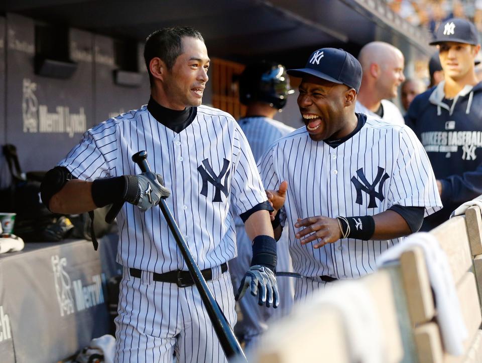 Ichiro makes lot of guys laugh, including Yankees teammate Zelous Wheeler (Getty Images)