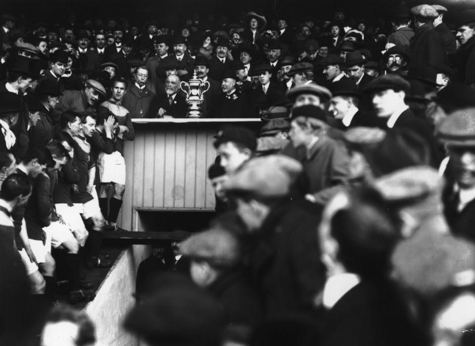 Bradford’s players await the FA Cup trophy presentation in 1911 (Getty Images)