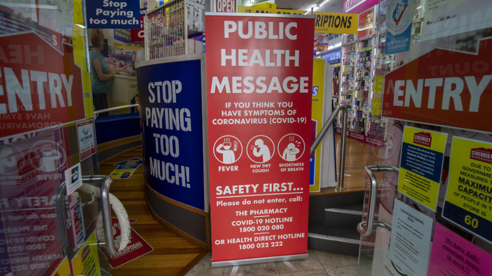 Chemist Warehouse sign asking customers to protect themselves against coronavirus.