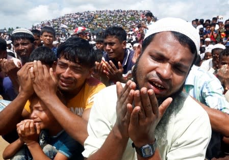 Rohingya refugees take part in a prayer as they gather to mark the second anniversary of the exodus at the Kutupalong camp in Cox’s Bazar