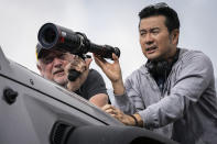 This image released by Universal Pictures shows Director of photography Stephen F. Windon, left, with director Justin Lin on the set of "F9." (Giles Keyte/Universal Pictures via AP)