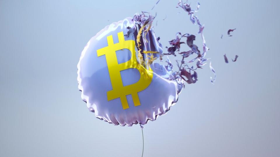 Ilustración de un globo con el símbolo de bitcoin explotando