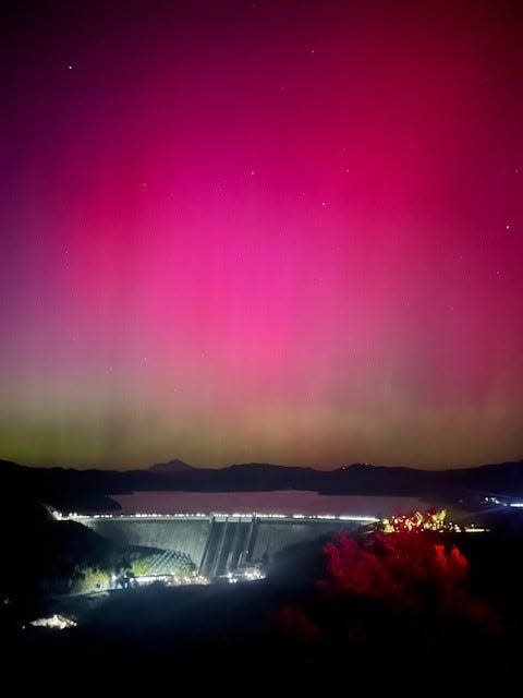 Redding resident Debra Fox took this photo of Shasta Dam under the northern lights just after midnight on Friday May 10, 2024.