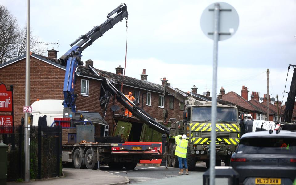 The crane had crashed through the roof of the building and severely damaged the front wall of the property