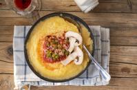 <p>You can dress up this bowl of soft, hearty bowl of polenta in a myriad of ways: Add fresh or frozen veggies, for one, or even leftover roasts or saved fish from your last formal dinner. The cornmeal and milk combine into a creamy base that's ready in just 12 minutes.</p><p><em><a href="https://www.goodhousekeeping.com/food-recipes/a8719/microwave-polenta-ghk0108/" rel="nofollow noopener" target="_blank" data-ylk="slk:Get the recipe for Microwave Polenta »;elm:context_link;itc:0;sec:content-canvas" class="link ">Get the recipe for Microwave Polenta »</a></em></p>