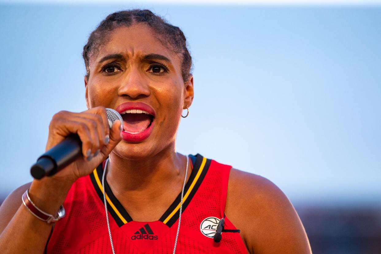 Former UofL basketball player Angel McCoughtry hypes up the crowd during the Louisville Live Hoops event at Churchill Downs on Saturday evening on Sept. 18, 2021. McCoughtry plans to launch a new website toward the end of 2022.