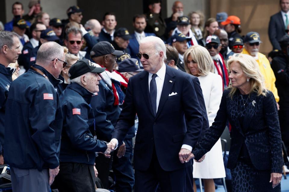 President Joe Biden and first lady Jill Biden attend a ceremony to mark the 80th anniversary of D-Day at the Normandy American Cemetery and Memorial in Colleville-sur-Mer, France, June 6, 2024 (REUTERS)