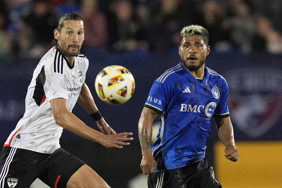 CF Montreal midfielder Josef Martinez, center, and FC Dallas defender Omar Gonzalez, left, move to the ball during the second half of an MLS soccer match Saturday, March 2, 2024, in Frisco, Texas. (AP Photo/LM Otero)
